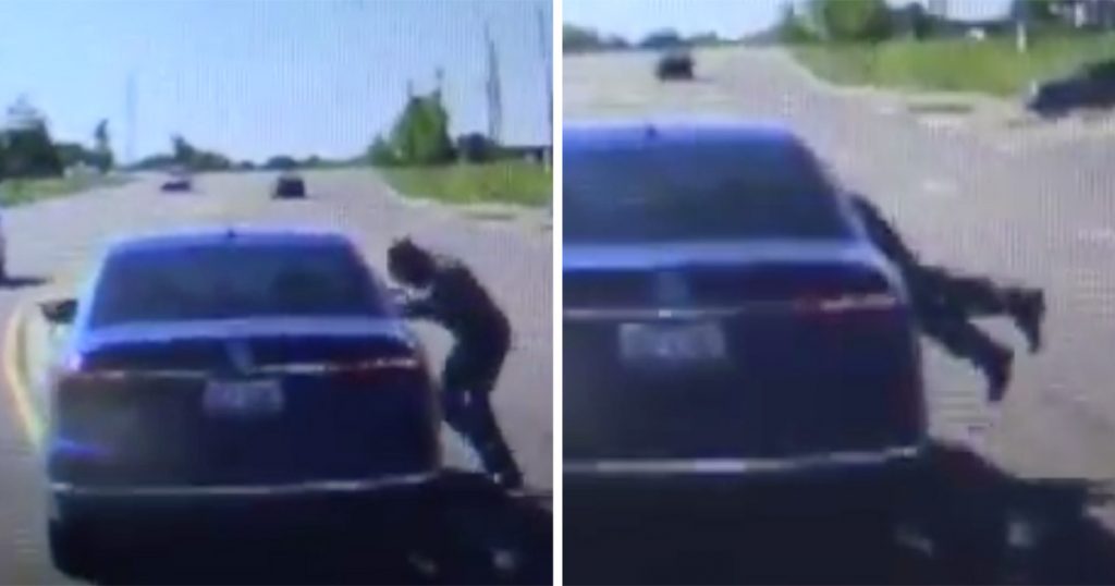 Cop Shocked When Stranger Dives through Car Window, Quickly Realizes He